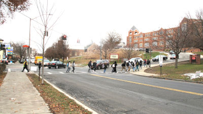 Photo of kids crossing the street in front of Sleepy Hollow Middle School / High School
