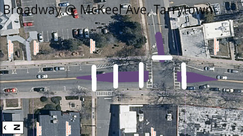 Aerial image of an intersection, with a median refuge drawn on it.